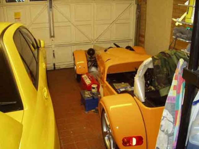Evo & Kit tucked up in garage