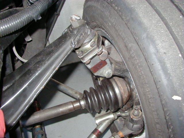 Another example of upper control arm attachment to strut style upright